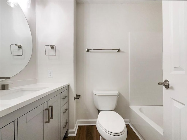 2140 Fern Valley Dr SW, Atlanta, GA 30331 - bathroom with hardwood / wood-style flooring, vanity, and toilet