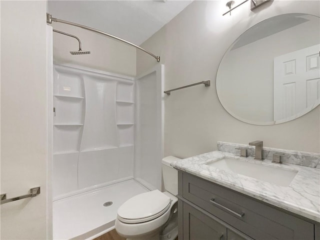 2140 Fern Valley Dr SW, Atlanta, GA 30331 - bathroom featuring a shower, vanity, and toilet