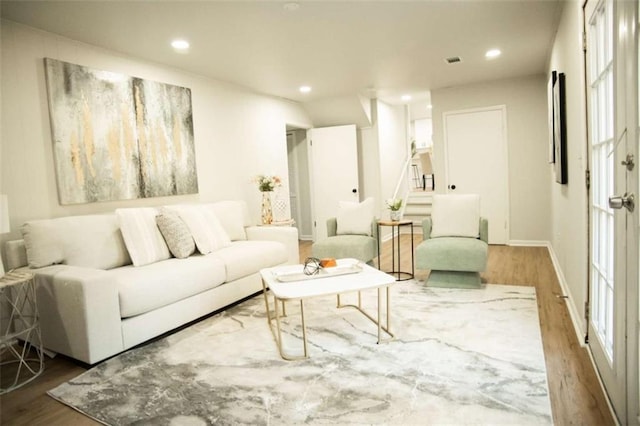 living room with hardwood / wood-style flooring