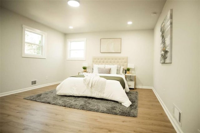 bedroom featuring wood-type flooring