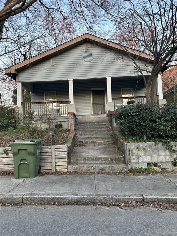 view of front of property featuring covered porch