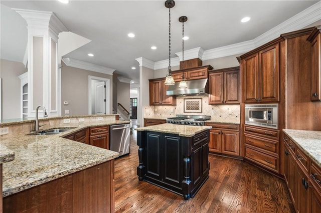 771 Tate Overlook, Marietta, GA 30064 - kitchen with stainless steel appliances, under cabinet range hood, a sink, a kitchen island, and dark wood-type flooring