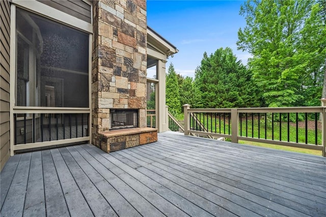 771 Tate Overlook, Marietta, GA 30064 - wooden deck featuring an outdoor stone fireplace