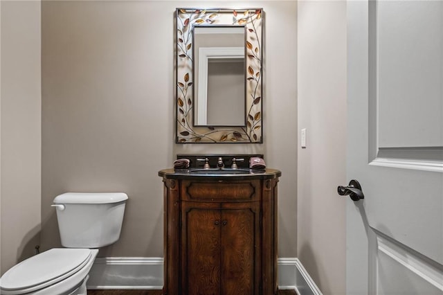 771 Tate Overlook, Marietta, GA 30064 - half bath featuring toilet, vanity, and baseboards