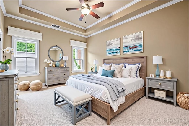 771 Tate Overlook, Marietta, GA 30064 - bedroom featuring light colored carpet, ornamental molding, a tray ceiling, and a ceiling fan
