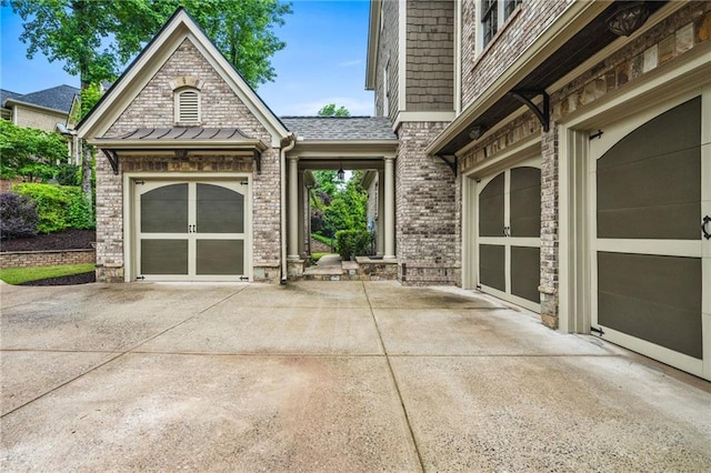 771 Tate Overlook, Marietta, GA 30064 - view of patio featuring concrete driveway and an attached garage