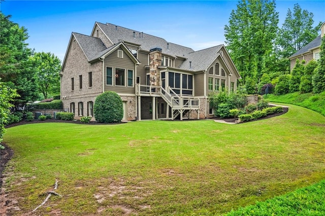 771 Tate Overlook, Marietta, GA 30064 - back of property with a sunroom, stairs, a lawn, and a deck
