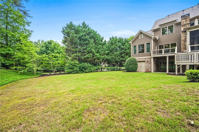 771 Tate Overlook, Marietta, GA 30064 - view of green lawn with a wooden deck