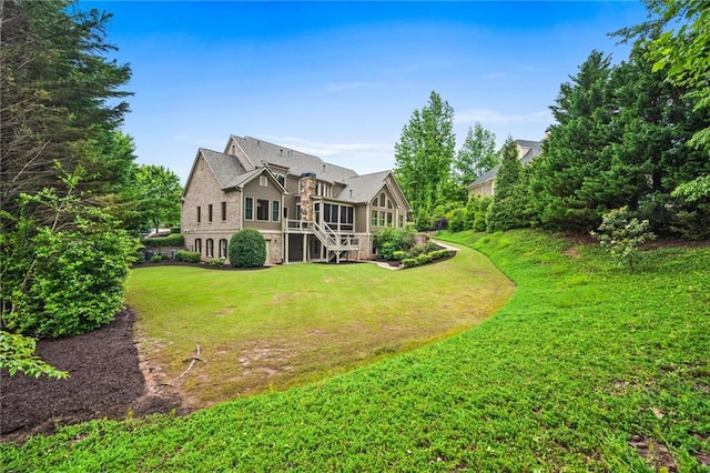 771 Tate Overlook, Marietta, GA 30064 - rear view of house featuring a lawn and stairway