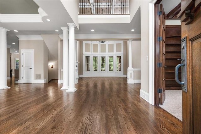 771 Tate Overlook, Marietta, GA 30064 - entrance foyer featuring ornate columns, crown molding, recessed lighting, wood finished floors, and baseboards
