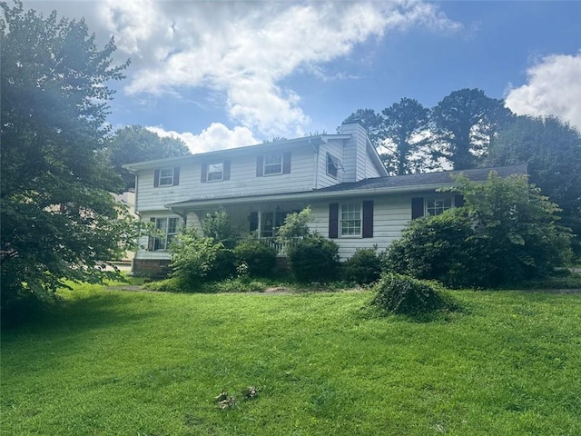 713 Pine Chase Ct, Lawrenceville, GA 30043 - view of front of property featuring a front lawn and a chimney