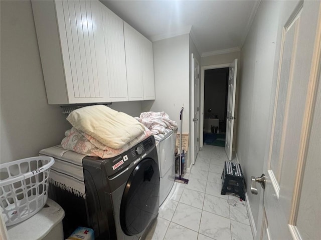 713 Pine Chase Ct, Lawrenceville, GA 30043 - washroom featuring cabinet space, washer / clothes dryer, crown molding, and light marble finish floors