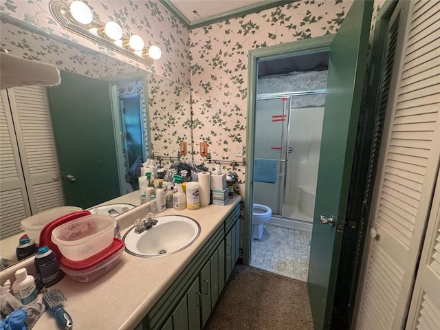 713 Pine Chase Ct, Lawrenceville, GA 30043 - bathroom with wallpapered walls, a closet, vanity, and a stall shower