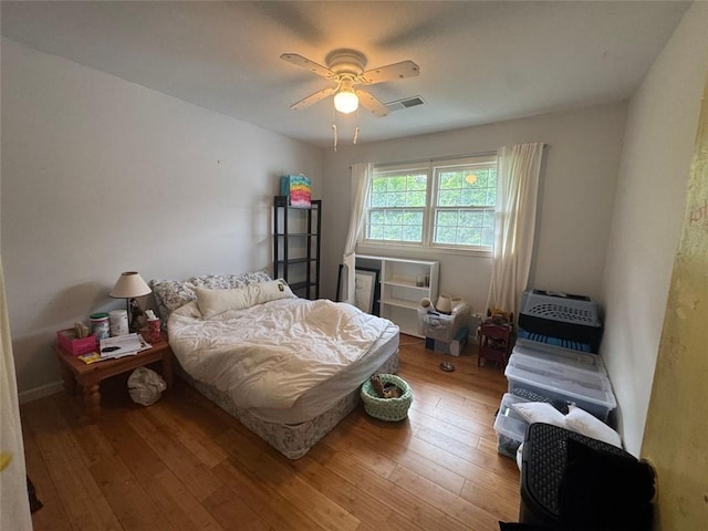 713 Pine Chase Ct, Lawrenceville, GA 30043 - bedroom with hardwood / wood-style floors and a ceiling fan
