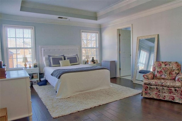 401 Iona Abbey Ct Unit 6, Smyrna, GA 30082 - bedroom with crown molding, a raised ceiling, and hardwood / wood-style floors