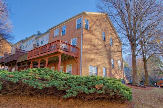 401 Iona Abbey Ct Unit 6, Smyrna, GA 30082 - back of house with a deck