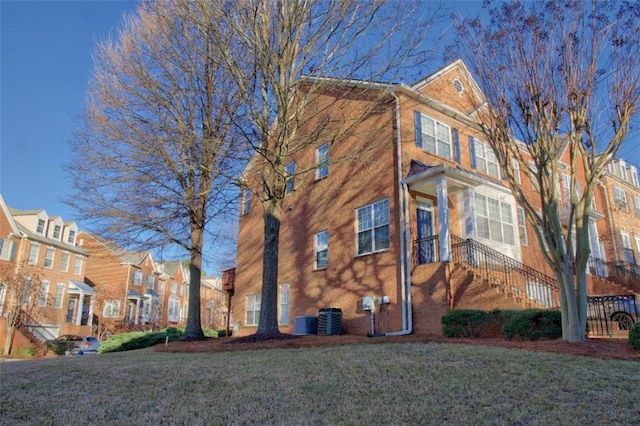 401 Iona Abbey Ct Unit 6, Smyrna, GA 30082 - view of side of property with a lawn and a residential view