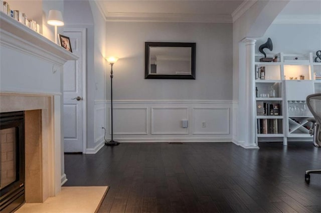 401 Iona Abbey Ct Unit 6, Smyrna, GA 30082 - unfurnished living room featuring dark wood-style floors, decorative columns, crown molding, wainscoting, and a decorative wall