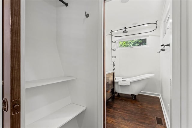 1734 8th St, Brookhaven, GA 30341 - walk in closet featuring dark wood-style flooring