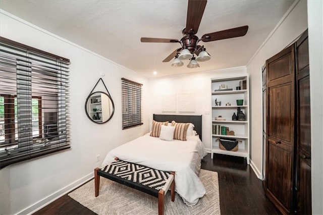 1734 8th St, Brookhaven, GA 30341 - bedroom featuring dark wood-style floors, ornamental molding, and a ceiling fan