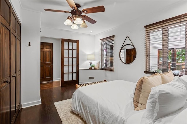 1734 8th St, Brookhaven, GA 30341 - bedroom with wood finished floors, a closet, and a ceiling fan