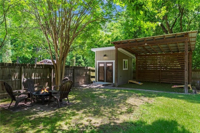 1734 8th St, Brookhaven, GA 30341 - fenced backyard featuring a fire pit