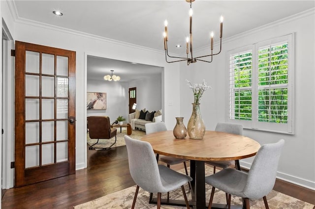 1734 8th St, Brookhaven, GA 30341 - dining space featuring a chandelier, dark wood-type flooring, and crown molding