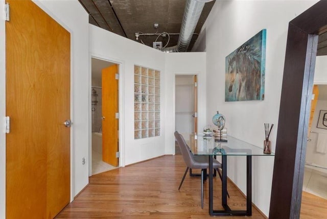 hallway featuring wood finished floors