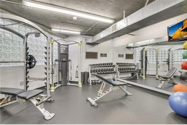 gym with concrete block wall