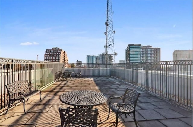 view of patio / terrace with a city view