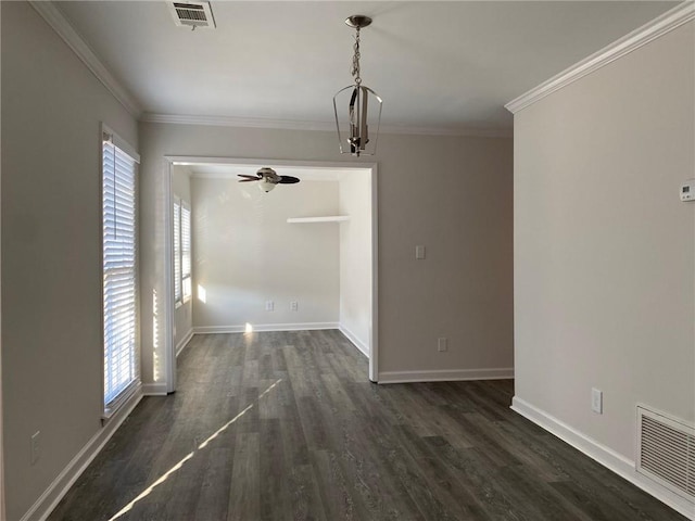 unfurnished dining area with ornamental molding, ceiling fan with notable chandelier, a wealth of natural light, and dark wood-type flooring