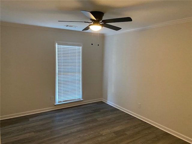 empty room with dark hardwood / wood-style flooring, ceiling fan, and ornamental molding