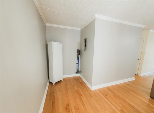 3905 Hunt Dr SE, Gainesville, GA 30507 - spare room featuring light wood finished floors and ornamental molding