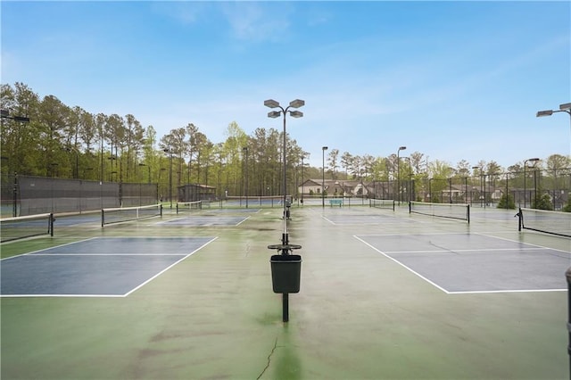 view of sport court featuring fence and community basketball court