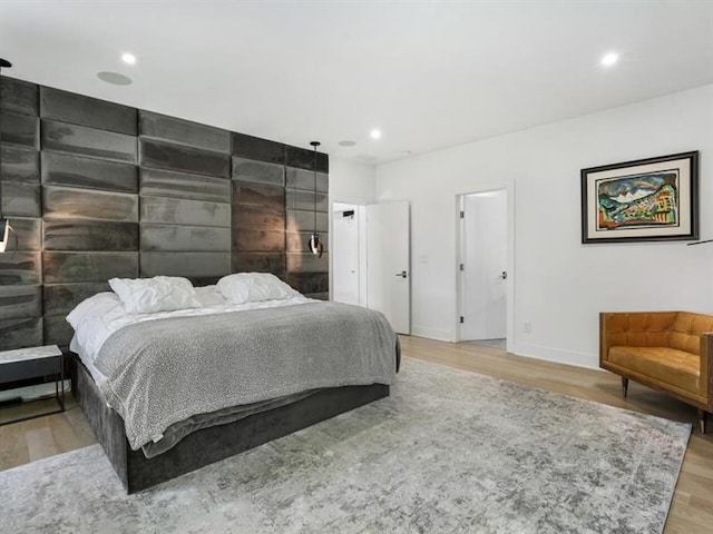 bedroom with light wood-type flooring