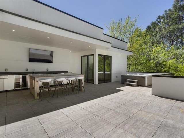 view of patio / terrace with an outdoor bar