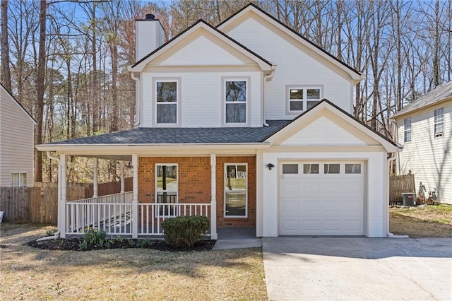 view of front of home with fence, a porch, concrete driveway, and brick siding