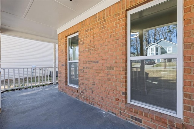 view of patio featuring a porch