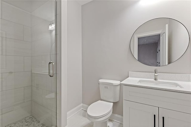 bathroom with walk in shower, vanity, and toilet