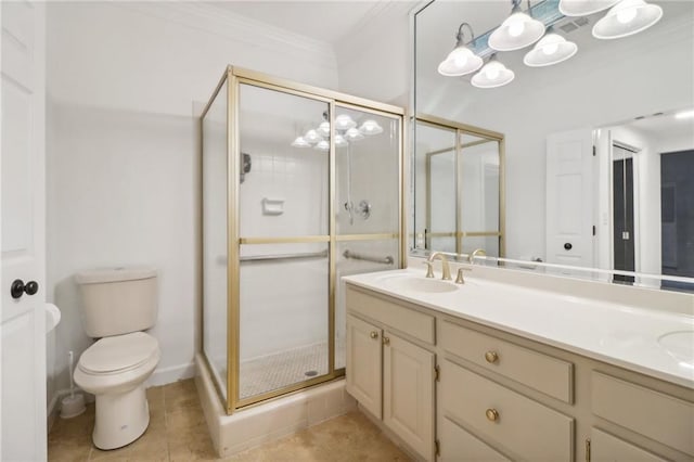 bathroom featuring a shower with door, double vanity, tile patterned flooring, crown molding, and toilet