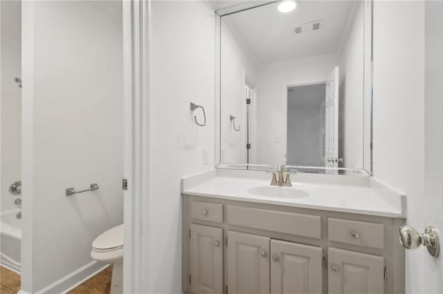 full bathroom featuring shower / washtub combination, toilet, and vanity