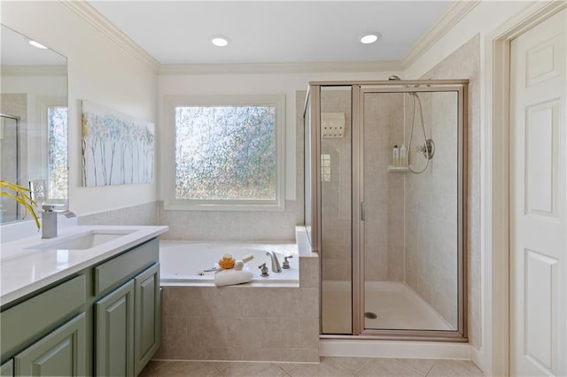 full bath with a garden tub, vanity, tile patterned flooring, and a shower stall