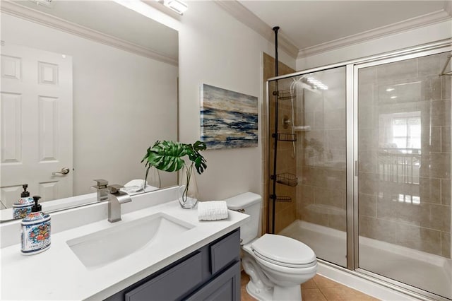 bathroom featuring toilet, ornamental molding, and a stall shower