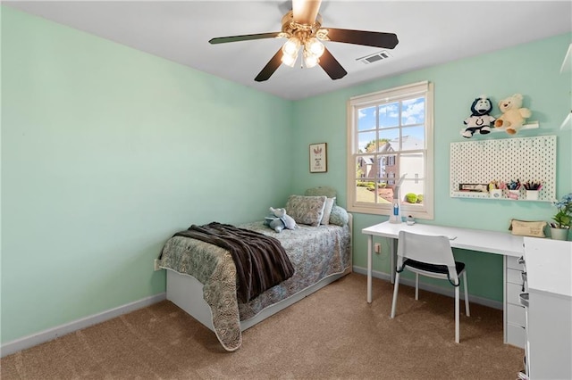 bedroom featuring carpet floors, a ceiling fan, baseboards, and visible vents