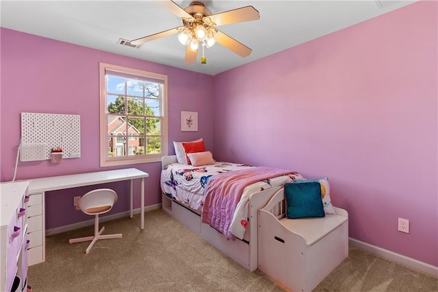 bedroom with carpet flooring, baseboards, visible vents, and ceiling fan
