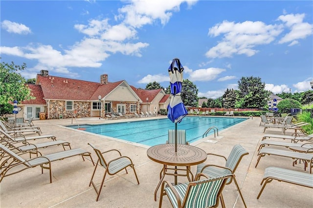 pool with a patio