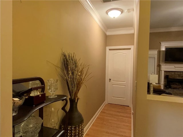 1162 Mason Lee, Loganville, GA 30052 - hallway featuring baseboards, wood finished floors, and crown molding