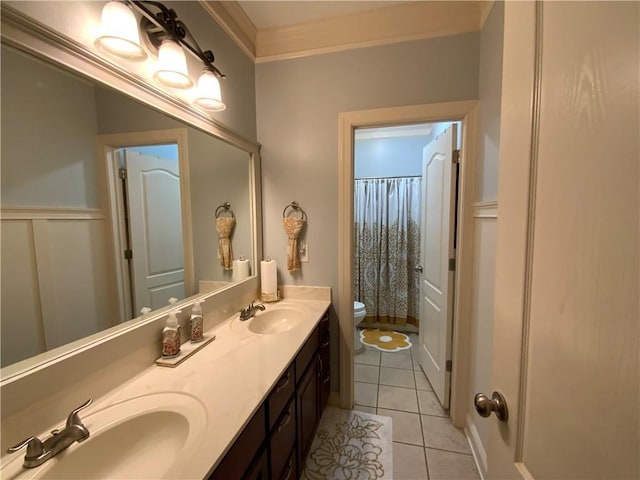 1162 Mason Lee, Loganville, GA 30052 - full bathroom with tile patterned floors, a sink, double vanity, and toilet