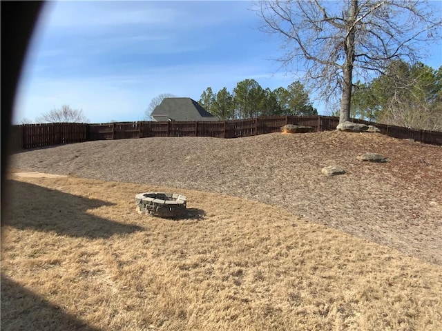 1162 Mason Lee, Loganville, GA 30052 - view of yard featuring an outdoor fire pit and fence
