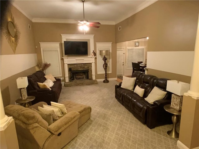1162 Mason Lee, Loganville, GA 30052 - living area featuring ornamental molding, a fireplace, a ceiling fan, and carpet